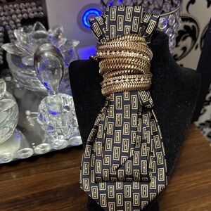 Elegant Gold and Black Patterned Tie